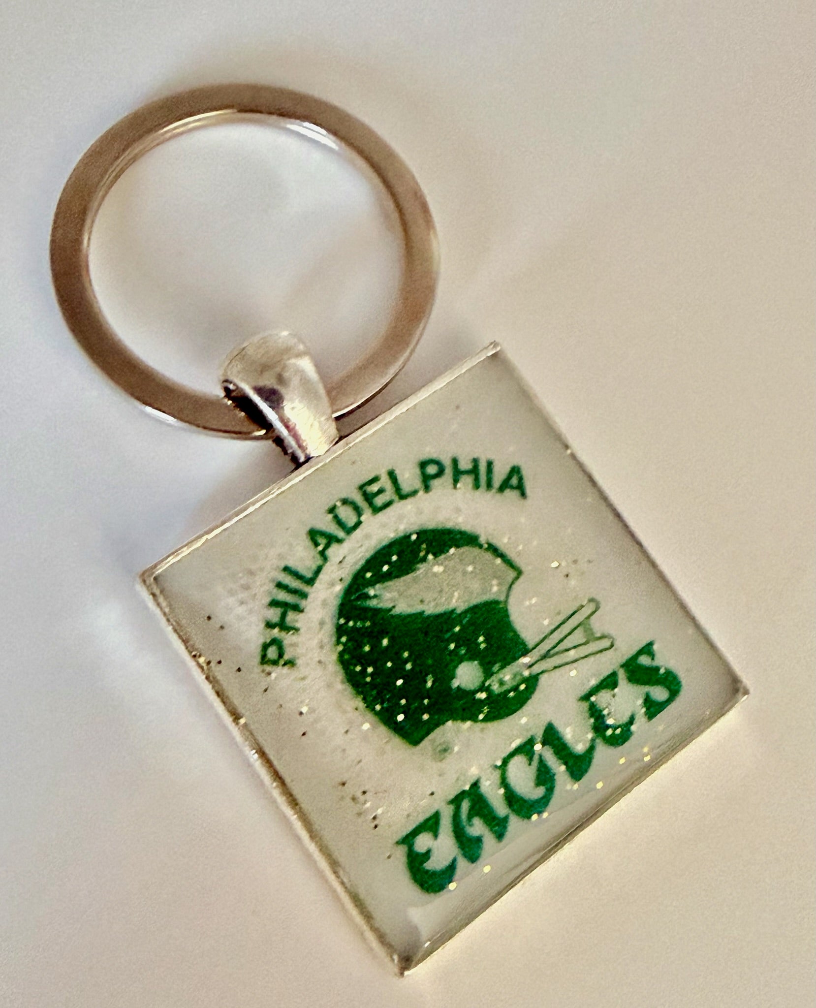 Sparkle Eagles Helmet | Resin Keychain by The Resin Bubble, detail view 1