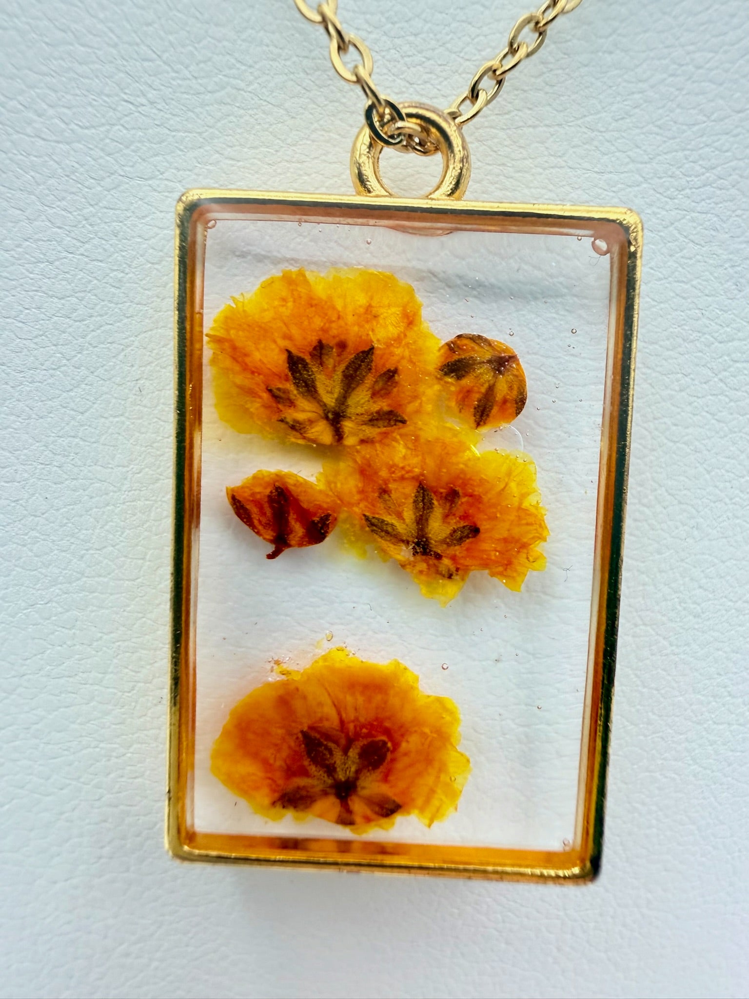 Sunlit Bloom handmade orange flower rectangular resin necklace