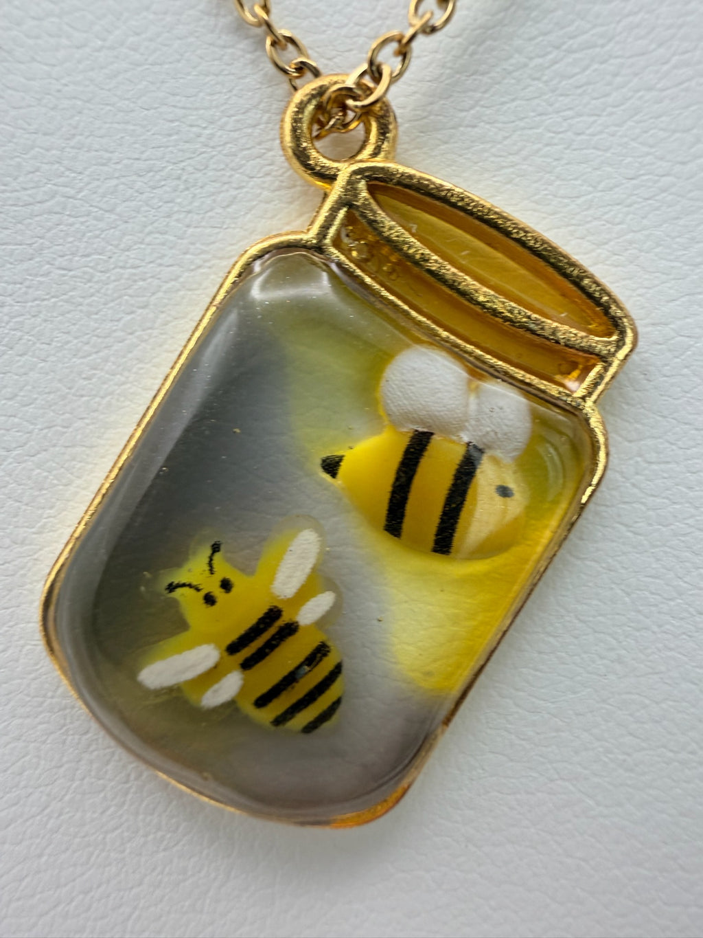 Bottled Sunshine handmade green and gold bottle-shaped resin necklace