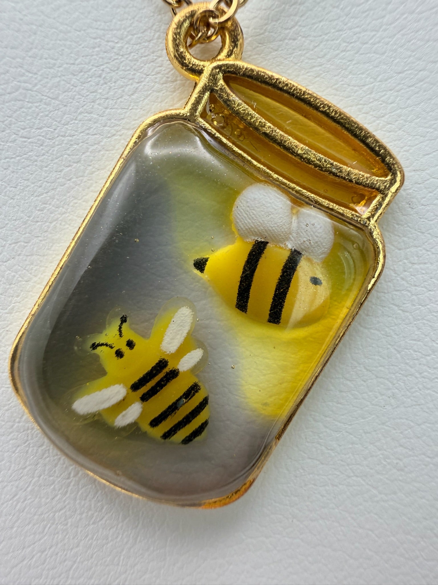 Bottled Sunshine handmade green and gold bottle-shaped resin necklace