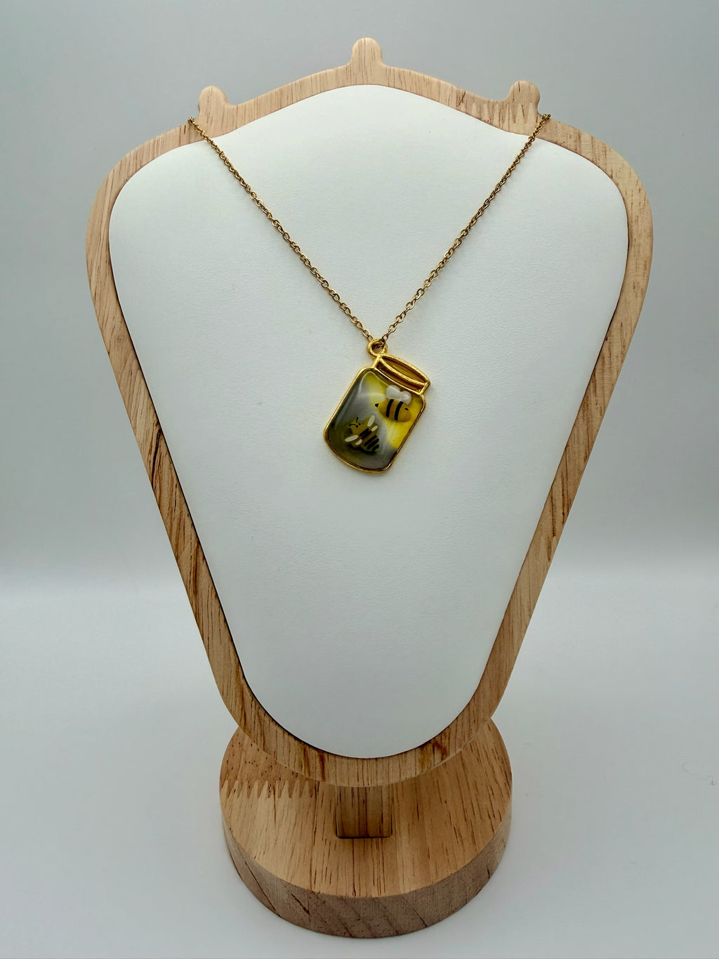 Bottled Sunshine handmade green and gold bottle-shaped resin necklace