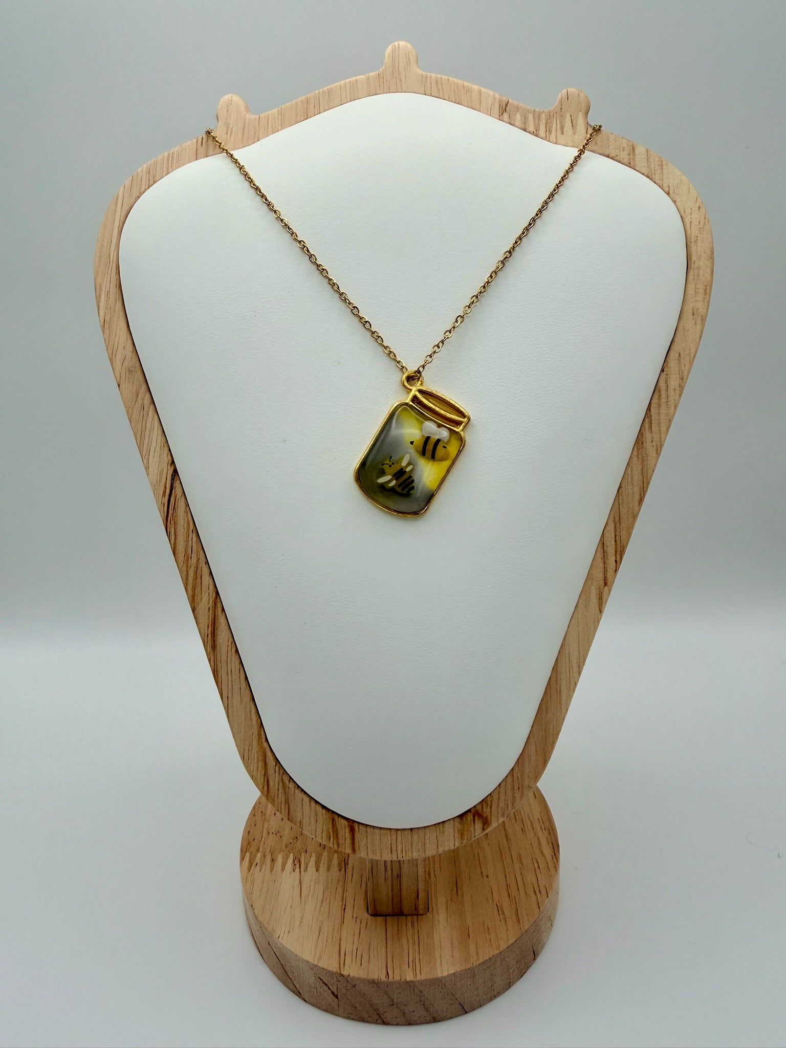 Bottled Sunshine handmade green and gold bottle-shaped resin necklace